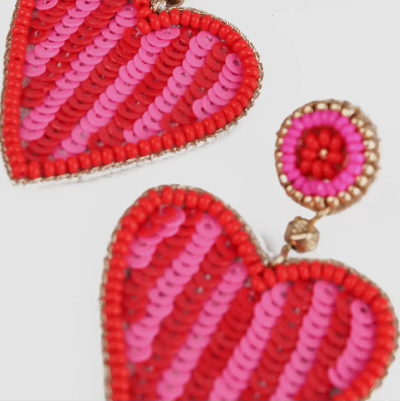 red and pink beaded heart statement earrings